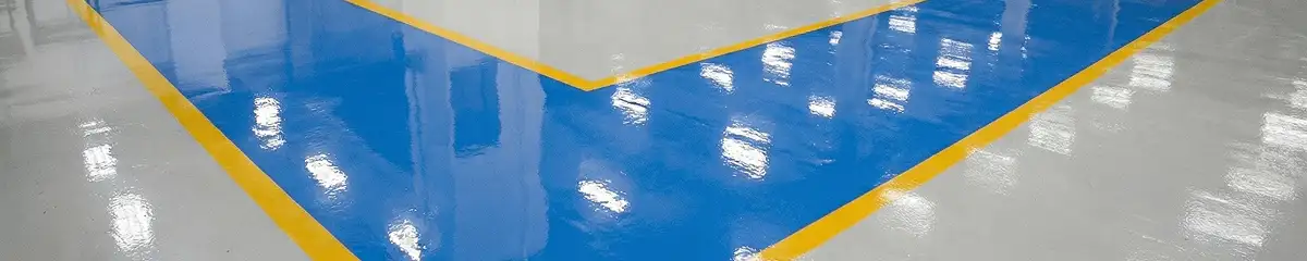 A factory floor professionally covered and marked with epoxy flooring in Cambridge, MA