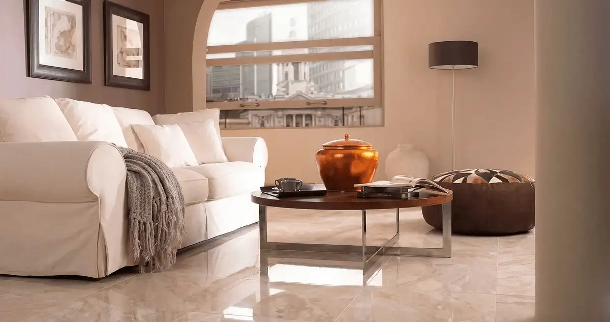 Modern living room with professionally installed marble flooring, a beige sofa, coffee table in Cambridge, MA