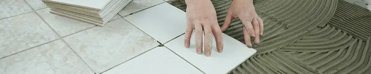 Professional installing white tile floors in Cambridge, MA