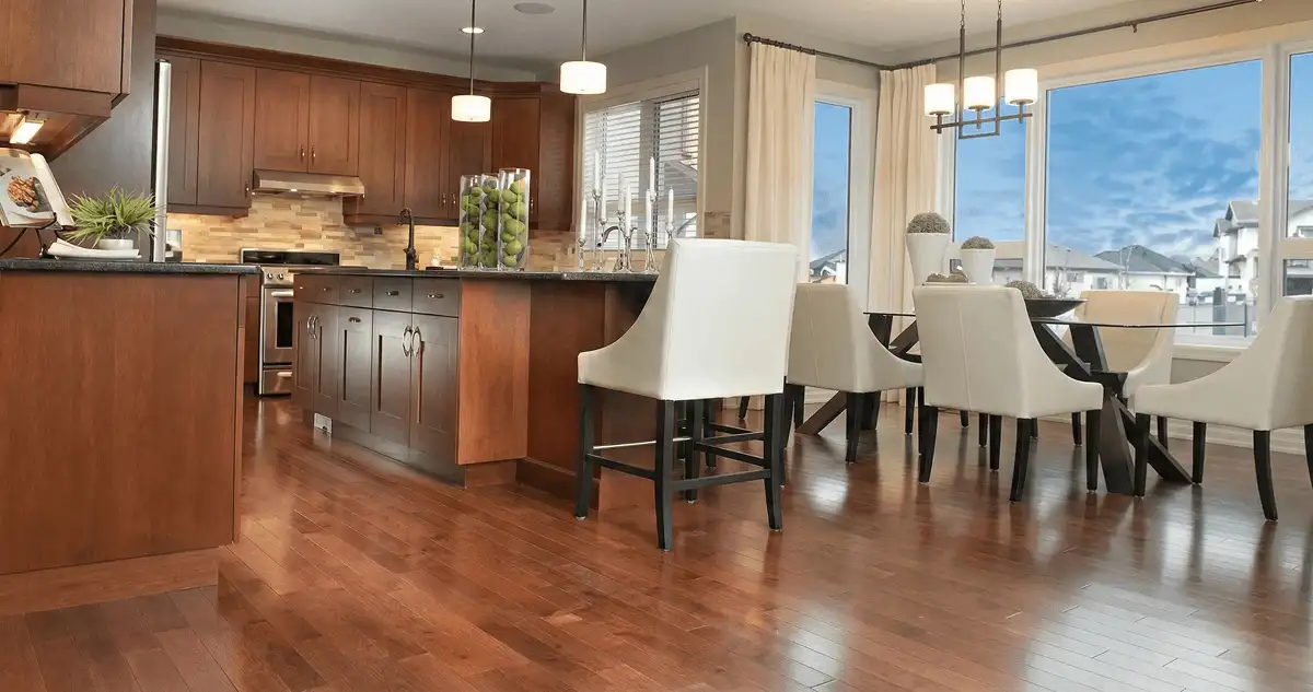 A modern kitchen with professionally installed wood flooring in Cambridge, MA